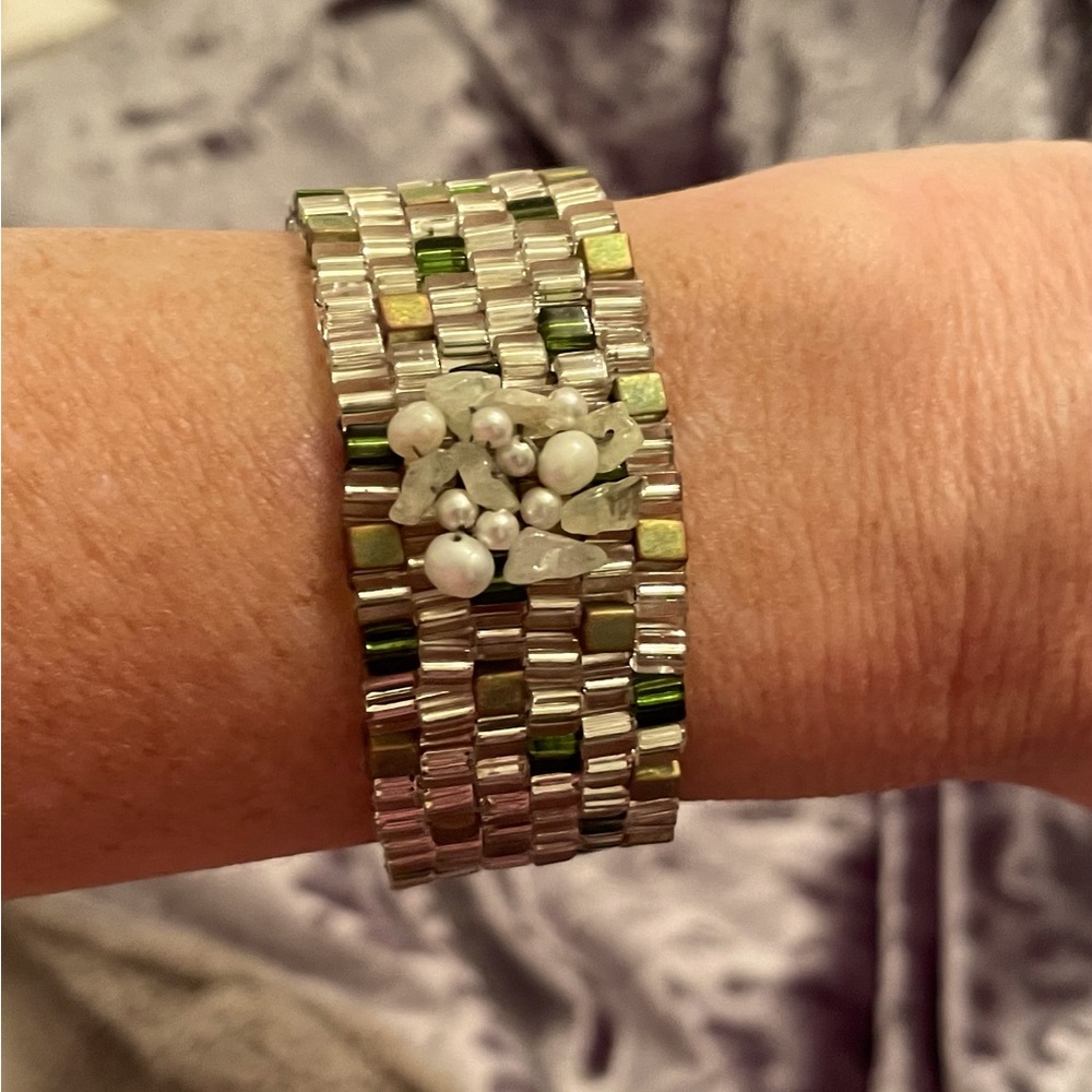 Beautiful hand-beaded sage green and silvery white bracelet.